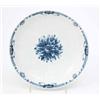 Image 1 : A Worcester saucer dish, painted with central flower in underglaze blue and bordered by moulded d...