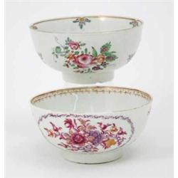 Two mid-18th century Worcester bowls, one painted in puce with two floral cartouches, the other w...