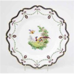 A Royal Worcester plate, painted with exotic birds by George Johnson between printed border of ga...