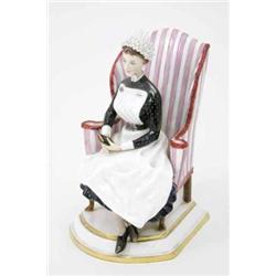 A Royal Worcester figure, Sister of St. Thomas' Hospital, a limited edition, seated figure in uni...