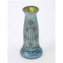 An iridescent glass posy vase in the style of Loetz, with sinuous engraved silver plant forms inl...