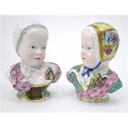 A pair of late 19th century Meissen portrait busts, boy and girl, each wearing scarf and encruste...