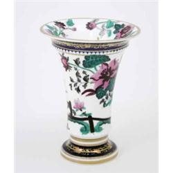 A Spode spill vase, of everted form printed and enamelled with flowers, circa 1830, 5.25in....