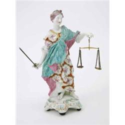A Derby figure of Justice, female figure holding scales and sword, clothed in floral painted dres...