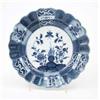 Image 1 : A Caughley scalloped plate, painted with root flowers and a butterfly in underglaze blue, the ree...