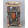 Image 1 : A Regency design circular rosewood bibliotheque with open shelves and leather book spine decorati...