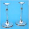 Image 1 : A pair of Swedish white metal candlesticks with tapered octagonal stems and loaded circular feet,...