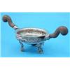 Image 1 : A South American white metal bowl, with wooden scroll handles and foliate scroll feet....