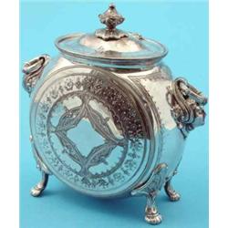 A B.M moonflask shaped biscuit barrel. together with a E.P. kettle on stand (2)...