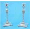 Image 1 : A pair of Edwardian silver Adam style candlesticks, with classical motif decoration and square fe...