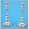Image 1 : A pair of William IV silver candlesticks, of knopped and fluted form with scroll and shell bandin...