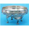 Image 1 : A George V silver rose bowl, with ribbon-tied swag decoration, raised on scroll legs with paw fee...