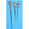 Image 1 : Three silver handled buttonhooks; Jester, Teddy Bear and Floral design....