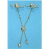 Image 1 : A pair of Edwardian gold, pale blue enamel and diamond set lace pins, with uniting trace link cha...