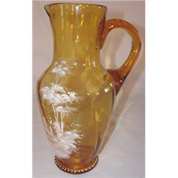 Mary Gregory amber glass enameled pitcher