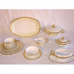 12 place settings of Old Knighthood china (102 total pieces)