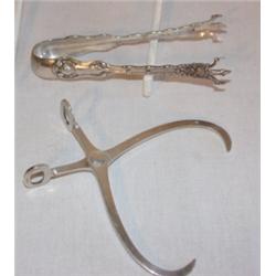 2 Sterling silver sugar tongs