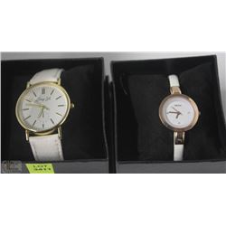 LOT OF TWO WOMENS WATCHES WITH WHITE STRAPS