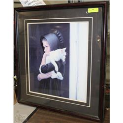 FRAMED PICTURE OF A GIRL HOLDING A CAT