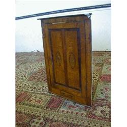 AN OAK CORNER HANGING CUPBOARD, George III, crossbanded panel door over a single small drawer, he...