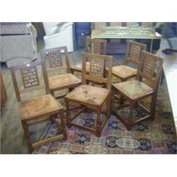 ROBERT 'MOUSEMAN' THOMPSON, a set of six dining chairs, oak quarter cut, plain board edge upright...