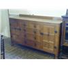 Image 1 : ROBERT 'MOUSEMAN' THOMPSON, an oak sideboard, adzed top, four drawers flanked by a cupboard each...