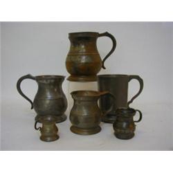 SIX PEWTER MEASURES, a James Yates quart, Gaskell and Chambers pint, a Victorian pint measure, a...