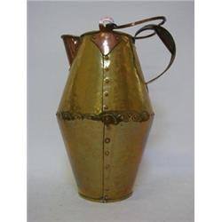 A BRASS AND COPPER PITCHER, Arts and Crafts style, hammered finish, stud joints, height 33cm  30-...