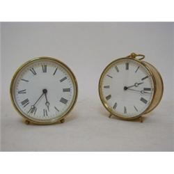 A PAIR OF TIMEPIECES, drum shaped brass bases, 9cm enamel Roman dials (two keys) (2)  20-40...