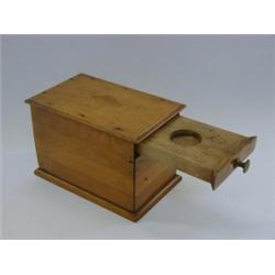 AN EDWARDIAN TREEN MONEY BOX, height 11cm  20-30...