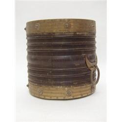 A CHAMPAGNE BUCKET, mid 19th century, turned cylinder, brass furniture and circular handles mount...