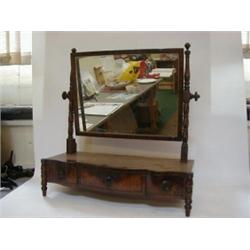A LATE GEORGIAN TOILET MIRROR, c.1820 - c.1830, mahogany rectangular plate, ring turned supports,...
