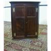 Image 1 : A MAHOGANY HANGING CORNER CUPBOARD, c.1800 two twin panelled front doors on brass H hinges openin...