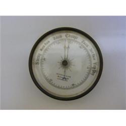 A CIRCULAR BAROMETER, late 19th Century, dial signed 'Reyolds & Son', diameter 13cm 30-40...