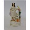 Image 1 : A CHIMNEY FIGURE, 20th Century, girl with parrot and rabbit, height 13cm 20-30...