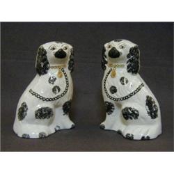 A PAIR OF STAFFORDSHIRE CHIMNEY SPANIELS, 19th Century, black and white coats, height 17cm (2)  4...