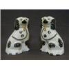 Image 1 : A PAIR OF STAFFORDSHIRE CHIMNEY SPANIELS, 19th Century, black and white coats, height 17cm (2)  4...