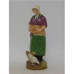 A ROYAL DOULTON FIGURE, 'The Farmer's Wife', HN2069, height 23cm 200-300...