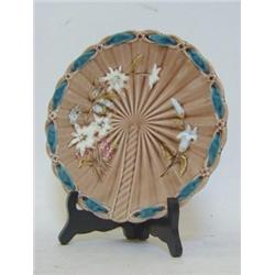 A MAJOLICA RIBBON PLATE, late 19th Century, moulded fan design, beige glaze, impressed '10888' di...