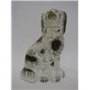 Image 1 : A STAFFORDSHIRE CHIMNEY SPANIEL, 19th Century, vlack and white coat, height 25cm 40-60...