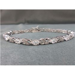 BRACELET - 12  OVAL FACETTED WHITE TOPAZ & DIAMONDS IN STERLING SILVER INFINITY LINK SETTING - ESTIM