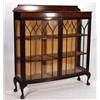 Image 1 : Bow fronted display cabinet fitted a pair o…