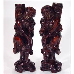 Pair of Oriental carved hardwood elders wit…