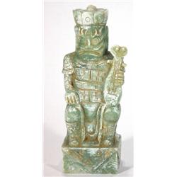 Carved green marble oriental seated god, cl…