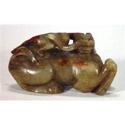 Carved soapstone ram with a monkey on its b…