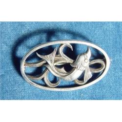 Art Nouveau style silver broach with diving…