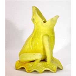 Yellow glazed Burmantofts style seated frog…