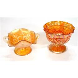 Twin handled orange carnival glass pedestal…