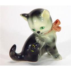 Hand painted Goebels seated kitten chasing …