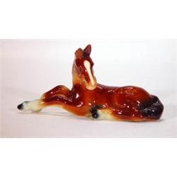 Hand painted seated Goebels foal, marks to …